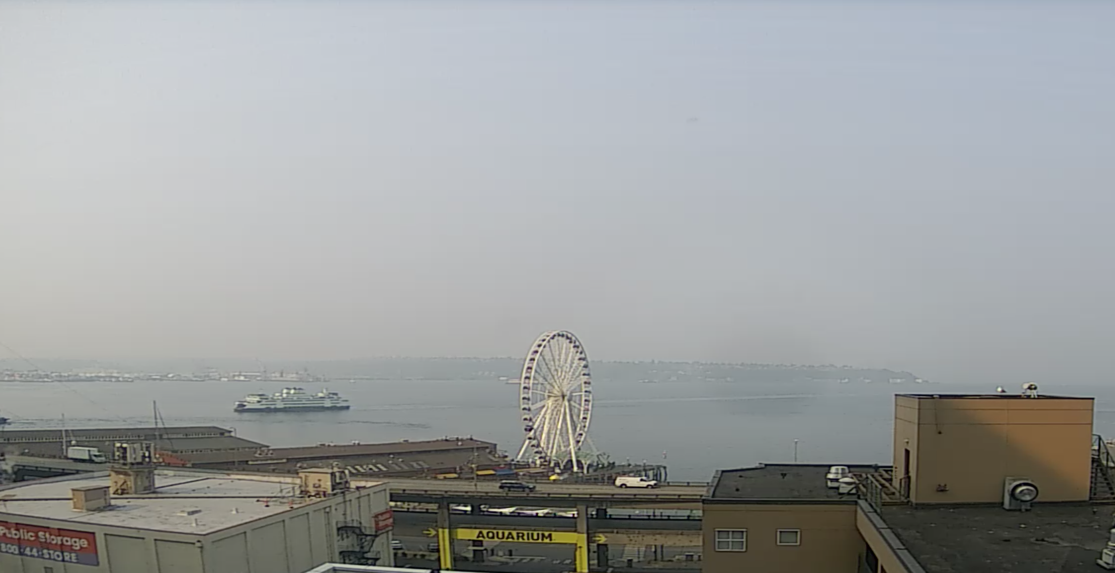 Seattle Waterfront Webcam SSW Hazy Day on Elliott Bay 08 14 2018