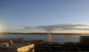 Seattle Waterfront Webcam SWW Plane at Twilight 08 04 2018